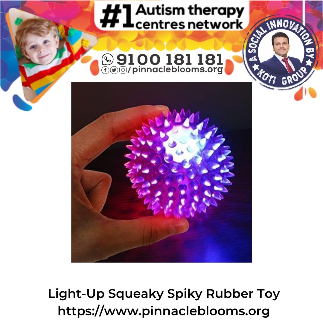 Light-Up Squeaky Spiky Rubber Toy