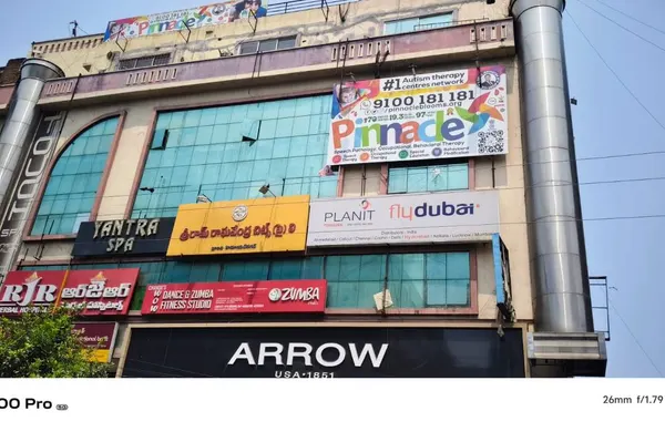 Building and Pinnacle signage at Himayat Nagar.
