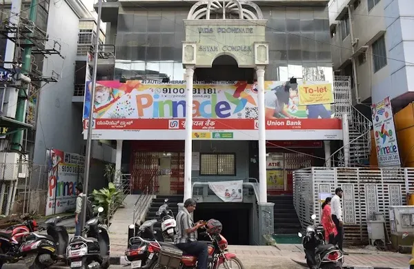 Building and Pinnacle signage at Indira Nagar.