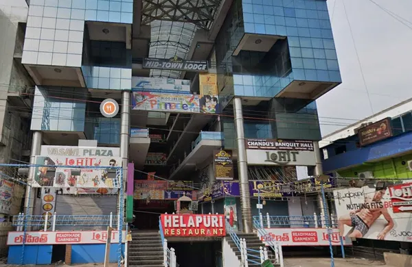 Building and Pinnacle signage at Jagadamba, Visakhapatnam.