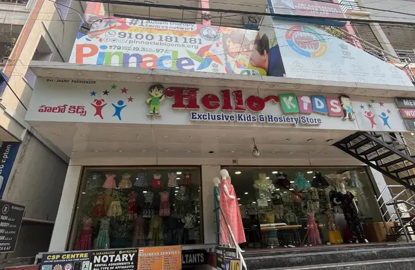 Building and Pinnacle signage at Pragathi Nagar.