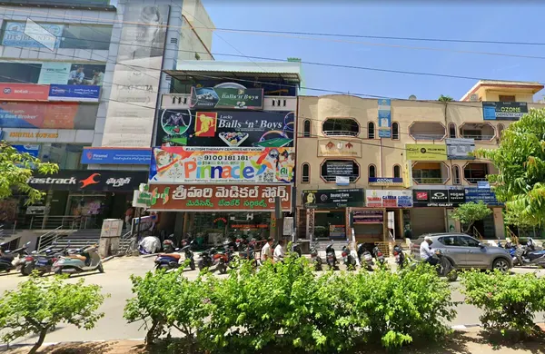 Building and Pinnacle signage at Tirupati.