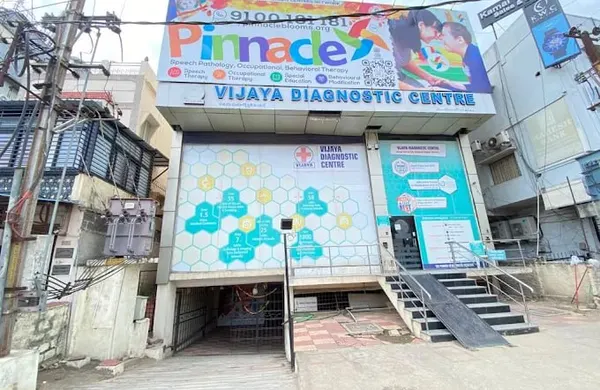 Building and Pinnacle signage at Vikrampuri.